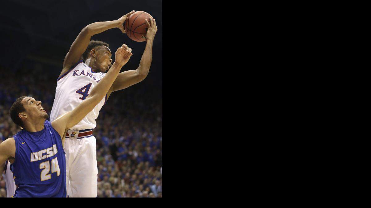 
Kansas guard Devonte Graham rebounded over UC Santa Barbara guard Michael Bryson during a game in November.
