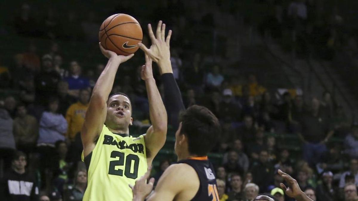 Baylor guard Manu Lecomte (left) scored 30 points in a victory over Oklahoma State on Monday.