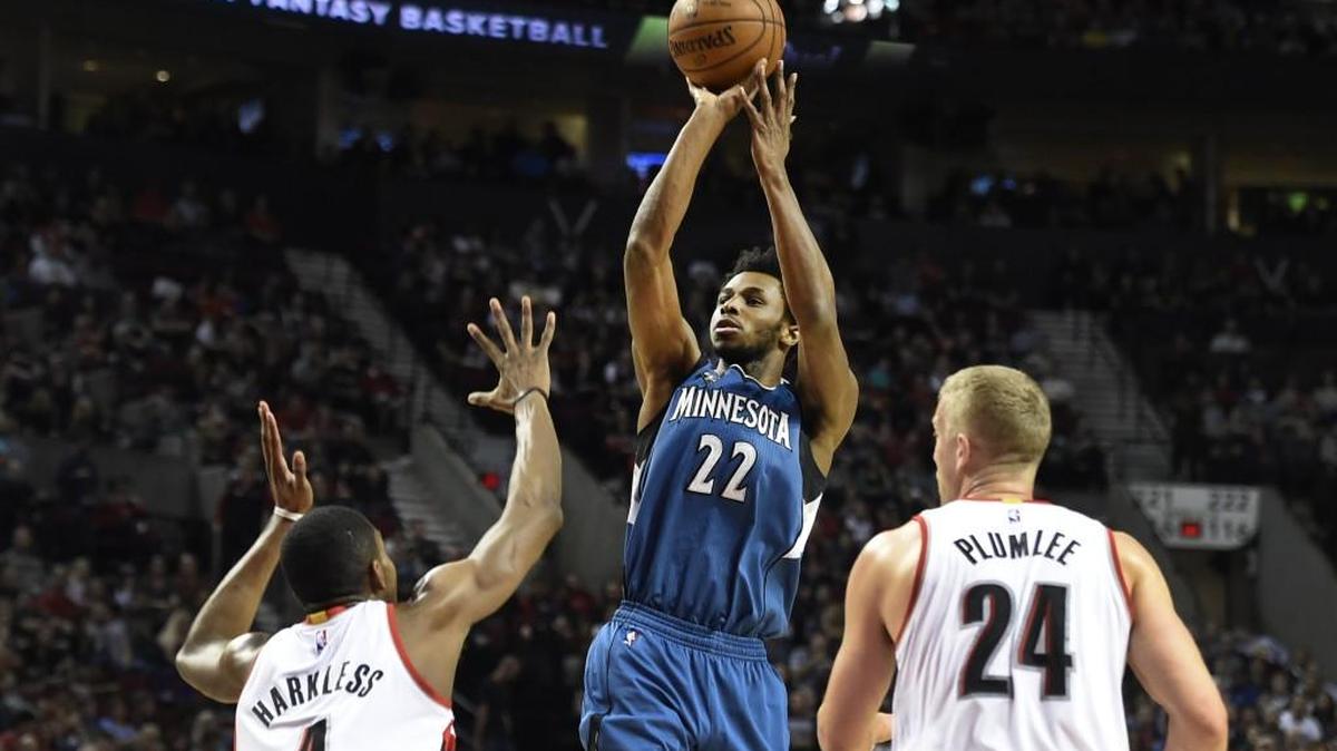 Former Kansas Jayhawk Andrew Wiggins (center) averaged 20.7 points and 3.6 rebounds last season with the Minnesota Timberwolves.