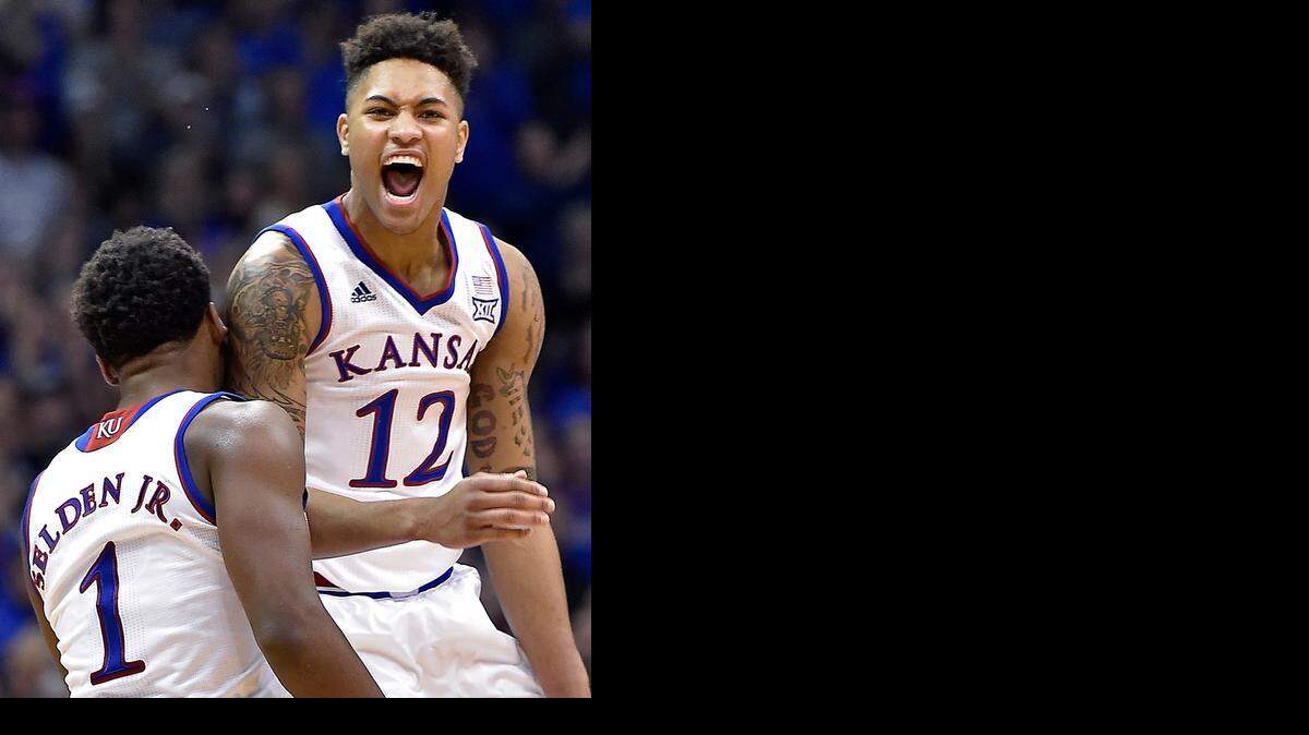 
KU’s Wayne Selden Jr. and Kelly Oubre Jr. celebrated during the Jayhawks‘ 76-61 victory Sunday over UNLV.


