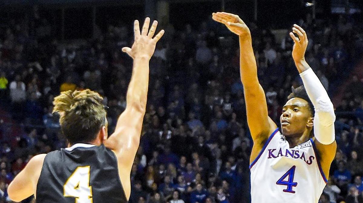 Jayhawks guard Devonté Graham (right) is ready to lead his team into the regular season. Kansas opens the regular season with Friday’s home game against Tennessee State.