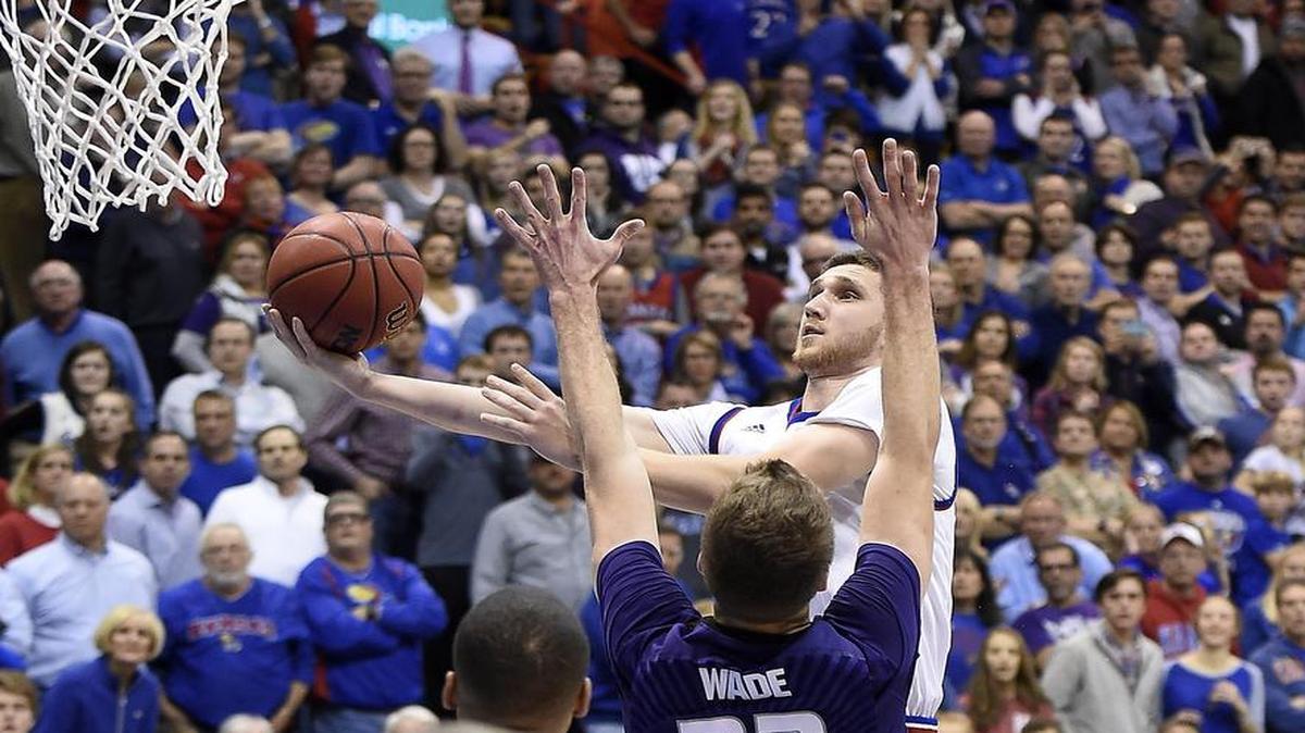 KU’s Svi Mykhailiuk went up over K-State’s Dean Wade and hit the game-winning layup on Jan. 3 at Allen Fieldhouse.