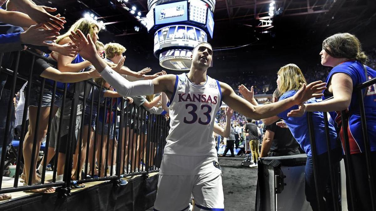KU’s Landen Lucas was greeted by fans after the Jayhawks downed Michigan State in the second round NCAA Tournament earlier this year.