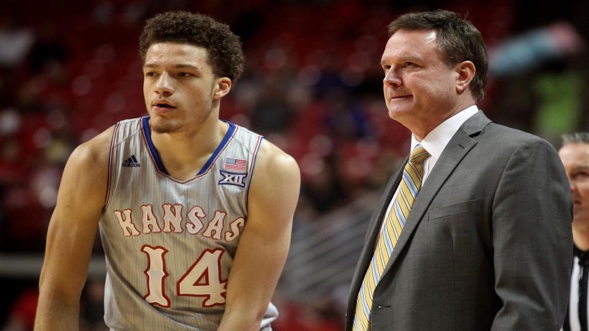Kansas basketball coach Bill Self talked with Brannen Greene during a game against Texas Tech in February.