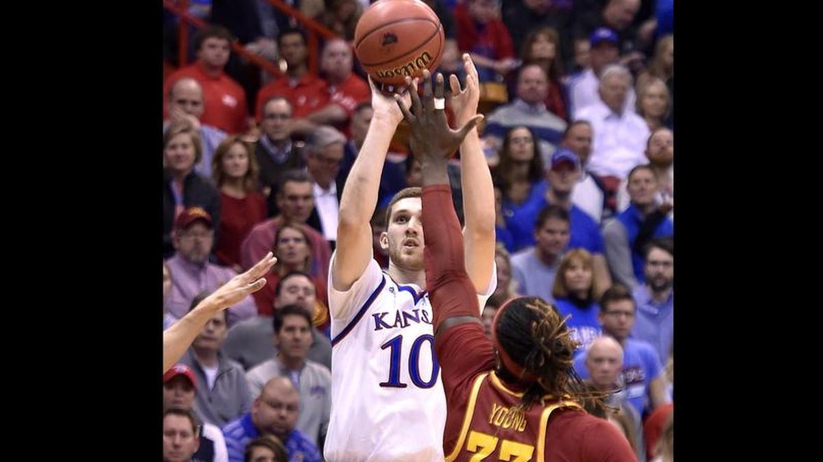 Svi Mykhailiuk (10) got off to a fast start against Iowa State, scoring the Jayhawks’ first nine points on three three-pointers. He took this long jumper over the Cyclones’ Solomon Young during the first half Tuesday.