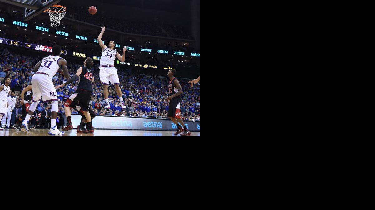 
Perry Ellis’ late bucket over Utah’s Jakob Poeltl helped lift the Jayhawks to a 63-60 win Saturday at the Sprint Center.
