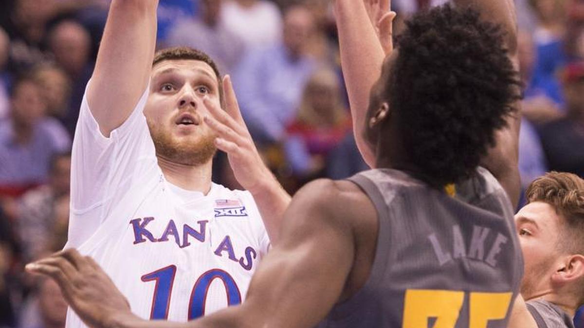 Kansas Jayhawks guard Sviatoslav Mykhailiuk (10) shot over Arizona State Sun Devils forward De'Quon Lake (35) in the first half during the team’s loss Sunday at Allen Fieldhouse. Mykhailiuk committed four turnovers in the game, all in the second half, leading to the Jayhawks being outscored 58-45 after the break.