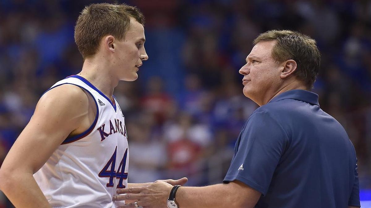 Mitch Lightfoot (left) hit 10 of 18 shots his freshman season for Kansas.