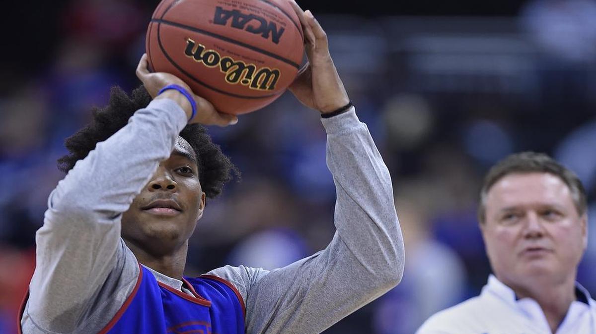 Kansas coach Bill Self (right) watched as the Jayhawks Devonte' Graham took shots from beyond the arc during the team's practice prior to an NCAA tournament third-round game in March at the Sprint Center.
