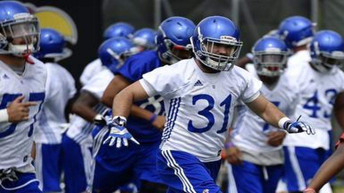 
Former KU linebacker Ben Heeney (31) made 127 tackles last season.
