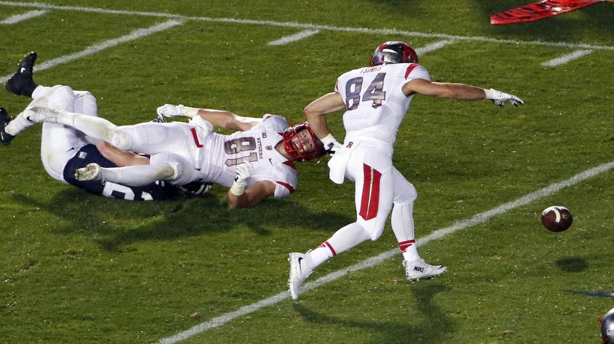 
Rutgers fell to 1-2 on the season after a 28-3 loss at Penn State in which tight end Matt Flanagan (left) fumbled as he was hit by Penn State linebacker Von Walker. Rutgers wide receiver John Tsimis (right) recovered the ball.
