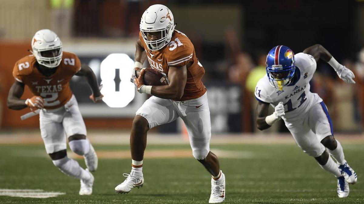 Texas linebacker Kyle Hrncir intercepted a pass in the first half of Saturday’s game against Kansas in Austin, Texas. KU sophomore quarterback Carter Stanley threw three interceptions in the game.