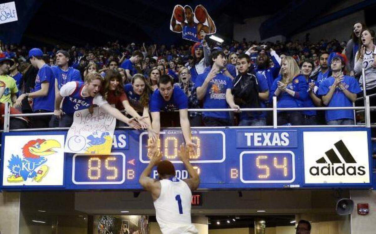 
Wayne Selden jumped into the arms of the KU student body on his way off the Allen Fieldhouse floor after KU beat Texas last season.
