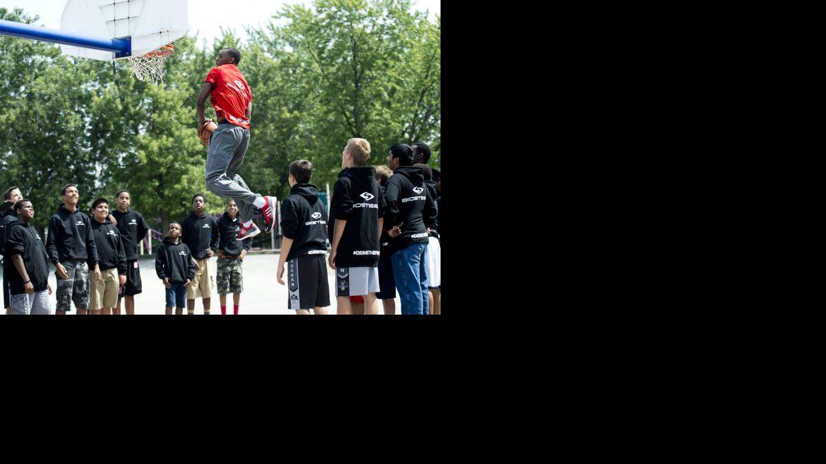 
NBA first-overall draft pick Andrew Wiggins had the attention of some Canadian students as he went up for a dunk while shooting a commercial Monday in Concord, Ontario.

