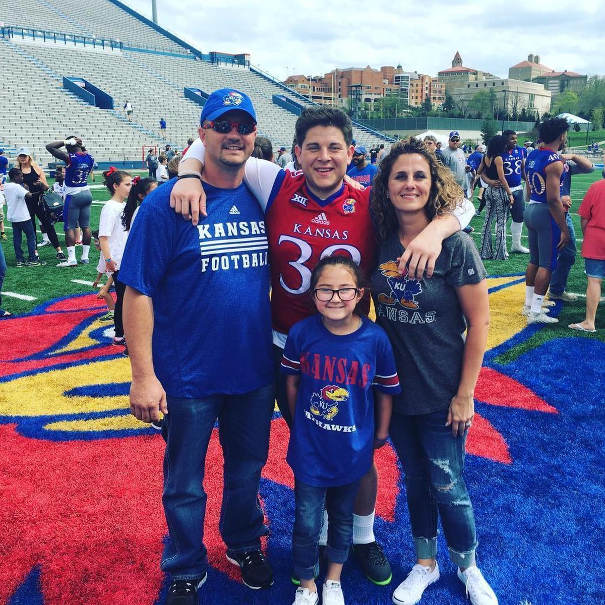 KU kicker Gabriel Rui (at center, rear) with his mother, Carolina (right), her husband, Mat Reynolds (left) and Gabriel’s sister Victoria (front).