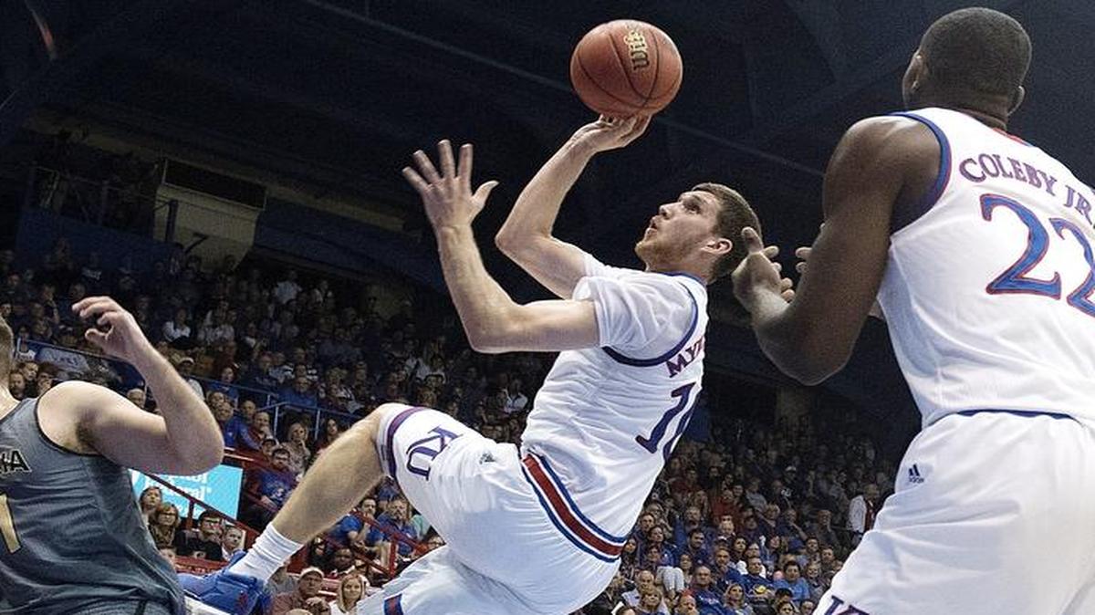 KU’s Sviatoslav Mykhailiuk (center) has been in a mini shooting slump.