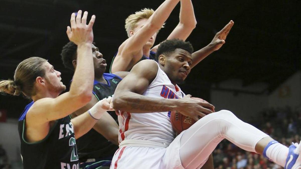 Hutchinson’s Shakur Juiston grabbed a rebound in front of Eastern Florida State players in the first half of the NJCAA men’s championship basketball game on March 25 in Hutchinson, Kan.