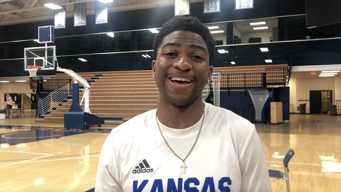 Kansas basketball freshman guard Kyle Cuffe smiles during an interview at Washburn’s basketball camp on June 8, 2021.