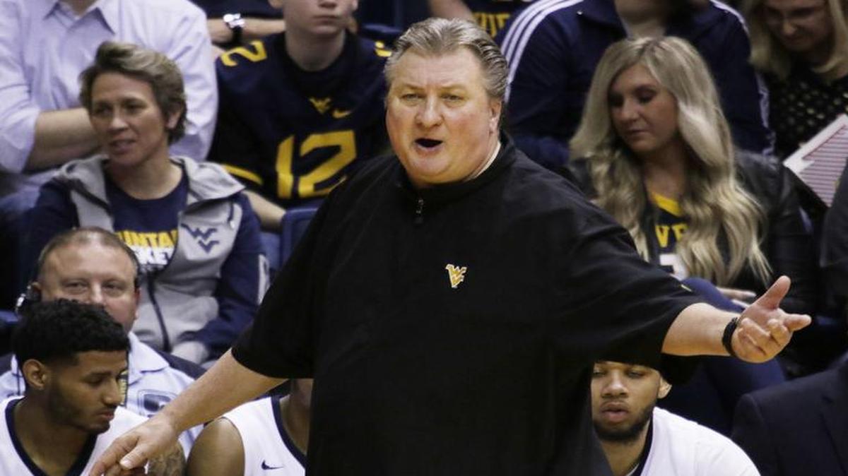West Virginia coach Bob Huggins has an 0-4 record with the Mountaineers against KU in Lawrence, where the teams will play at 8 p.m. Monday.