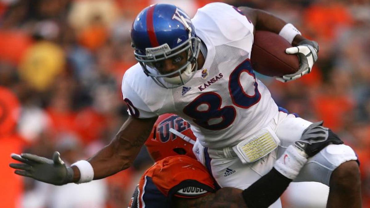Kansas receiver Dezmon Briscoe tried to elude a tackle by UTEP defender Da’Mon Cromartie Smith during a game on Sept. 12, 2009, in El Paso, Texas. It was KU football’s last road win.