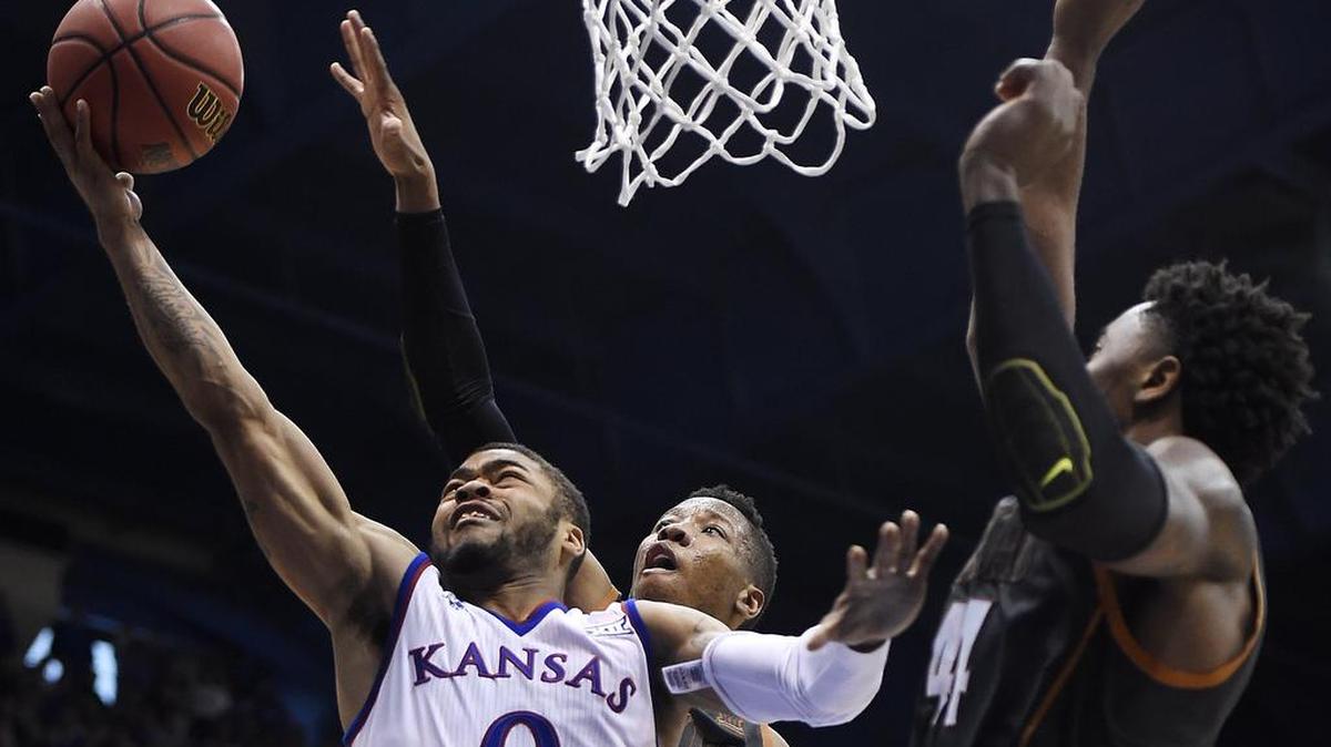 Frank Mason (left) and Kansas will open the 2016-17 season against Indiana on Nov. 11 in Honolulu and then play Duke four days later in New York.
