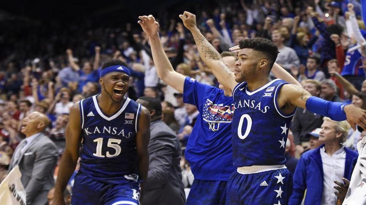 Carlton Bragg (left) and his KU teammates celebrated during the Jayhawks’ 86-65 win over Siena on Friday at Allen Fieldhouse.