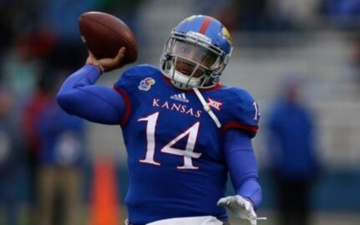 
Kansas quarterback Michael Cummings passed for 332 yards against TCU on Saturday.


