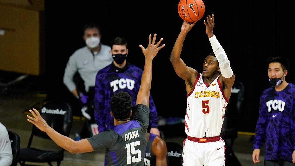 Former Iowa State guard Jalen Coleman-Lands (5) shoots a 3-point basket over TCU forward Terren Frank (15) during the first half of a game on Saturday, Feb. 27, 2021, in Ames, Iowa.