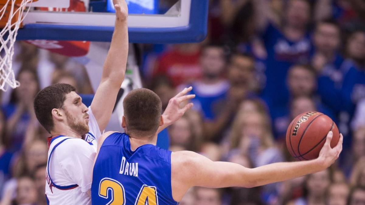 Svi Mykhailiuk (left) has gotten praise from KU coach Bill Self for his defense this season.