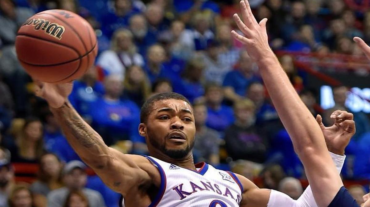 Frank Mason (left) is averaging 13.3 points per game for Kansas this season.