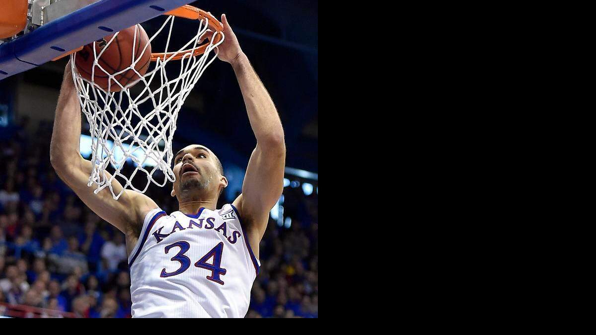 
KU's Perry Ellis slams home two of his eight first half points during the opening period of Saturday's game at Allen Fieldhouse. Baylor led KU, 33-27 at the break.
