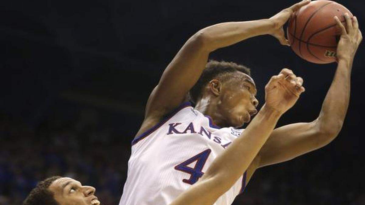 
Kansas guard Devonte Graham rebounded over UC Santa Barbara guard Michael Bryson during a game in November.
