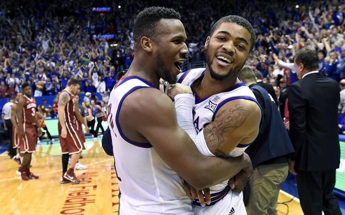 Kansas’ Wayne Selden (left) and Frank Mason celebrated their team’s 109-106 victory in triple overtime over Oklahoma on Jan. 4 in Lawrence. The Jayhawks face the Sooners on Saturday, this time in Oklahoma.