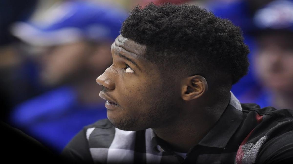KU's Carlton Bragg watched a game against Nebraska in street clothes from the end of the Jayhawks bench on Dec. 12.