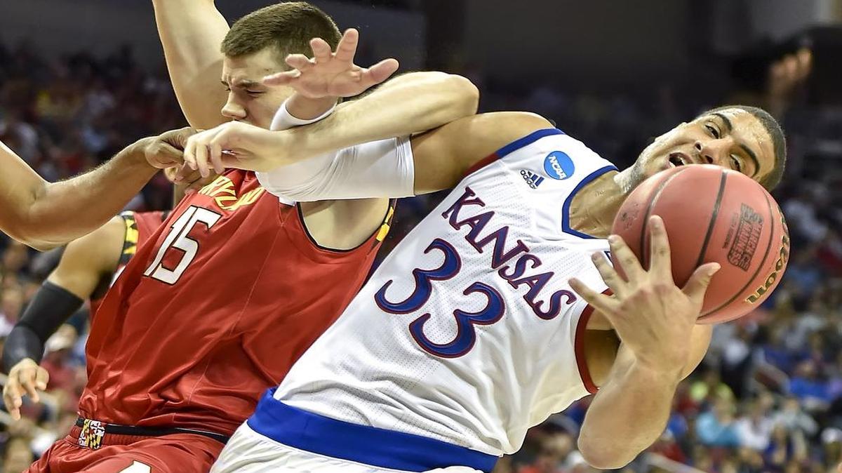 Kansas forward Landen Lucas (right) fought for a rebound with Maryland forward Michal Cekovsky in an NCAA Tournament game in March.