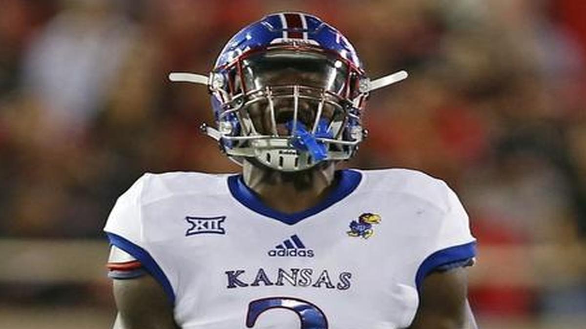 Kansas’ Dorance Armstrong celebrated after tackling Texas Tech quarterback Patrick Mahomes during Thursday’s game.