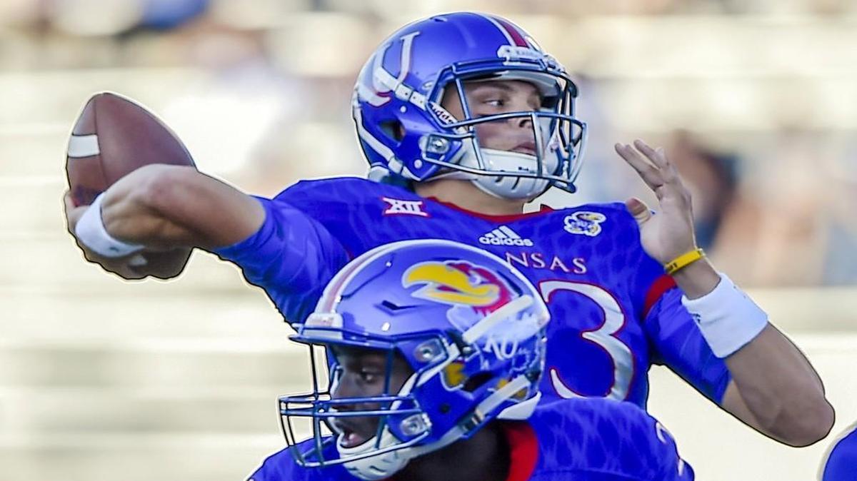 Kansas quarterback Ryan Willis completed 62 percent of his passes for 811 yards with three touchdowns and seven interceptions in the 2016 season. He later transferred to Virginia Tech.