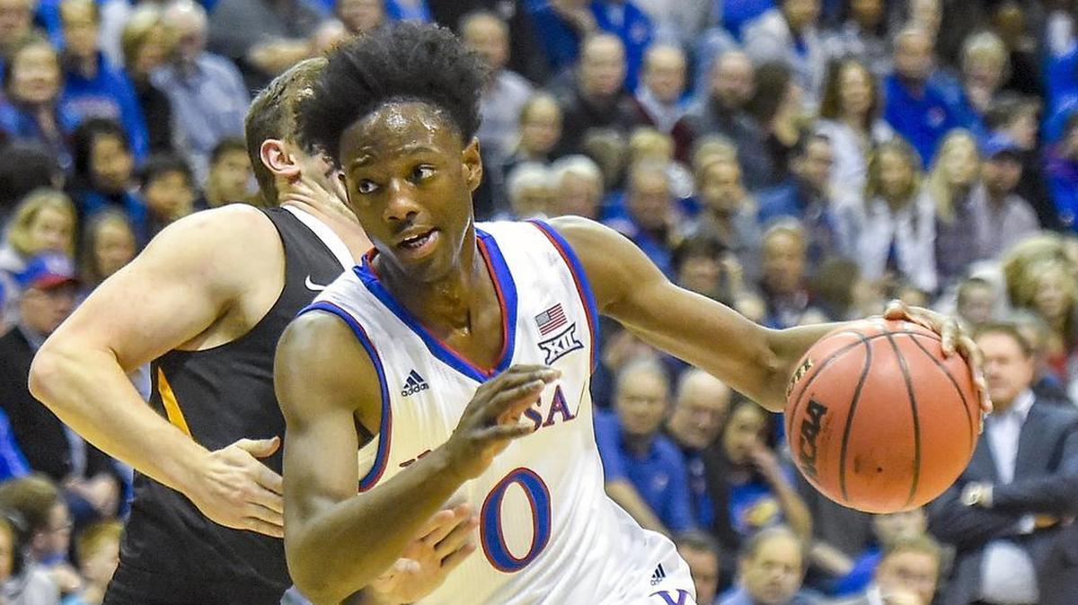 Kansas’ Marcus Garrett drove past a Fort Hays State player in Tuesday’s exhibition game at Allen Fieldhouse in Lawrence.
