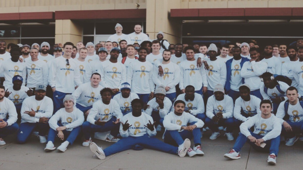 KU football coach David Beaty tweeted this photo of the Jayhawks wearing #TeamCole shirts to support Cole Hayden on November 25, 2016.