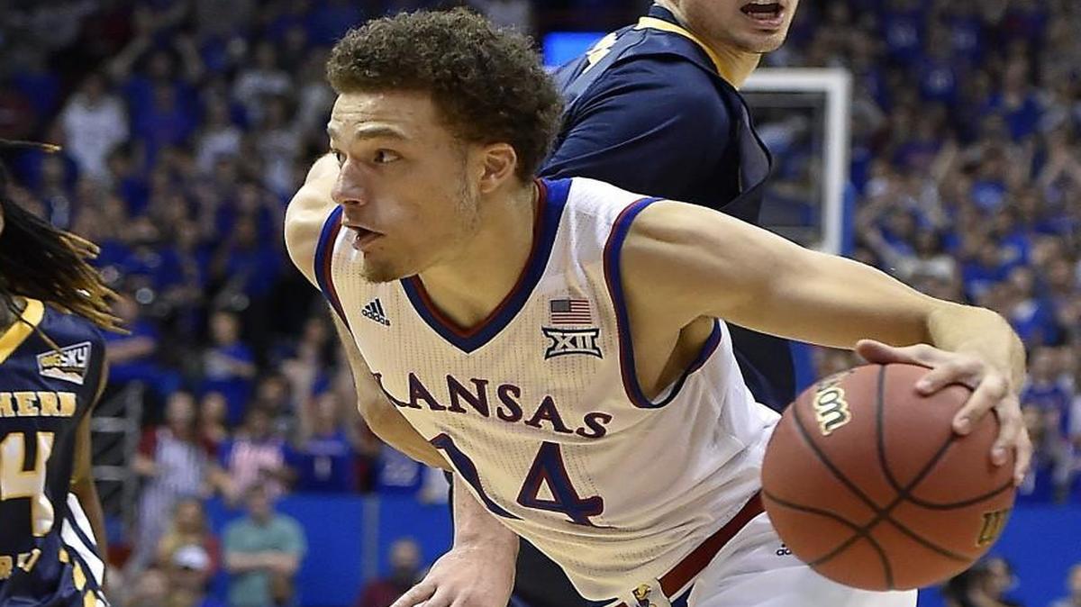 Former KU basketball player Brannen Greene (14) was uninjured after being involved in a car accident while traveling via Uber from a New York airport to a condo. The guard, who on March 30 declared for the NBA draft, had just arrived in New York to work out for pro teams.