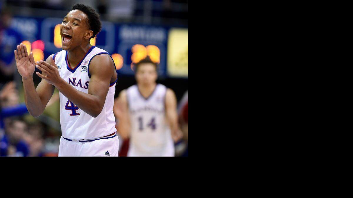 
KU's Devonte’ Graham led the cheers after the Jayhawks forced a Baylor turnover in the first half of Saturday’s game at Allen Fieldhouse, in Lawrence. The No. 8-ranked Jayhawks beat the No. 16 Bears 74-64.
