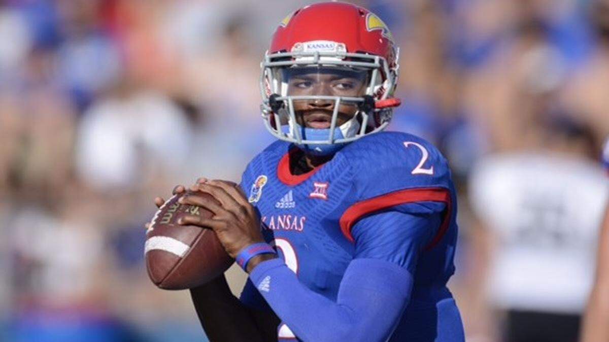 
Quarterback Montell Cozart and the Kansas Jayhawks begin the 2014 tonight facing Southeast Missouri State in Lawrence. The Jayhawks hope to improve on last season’s 3-9 record.
