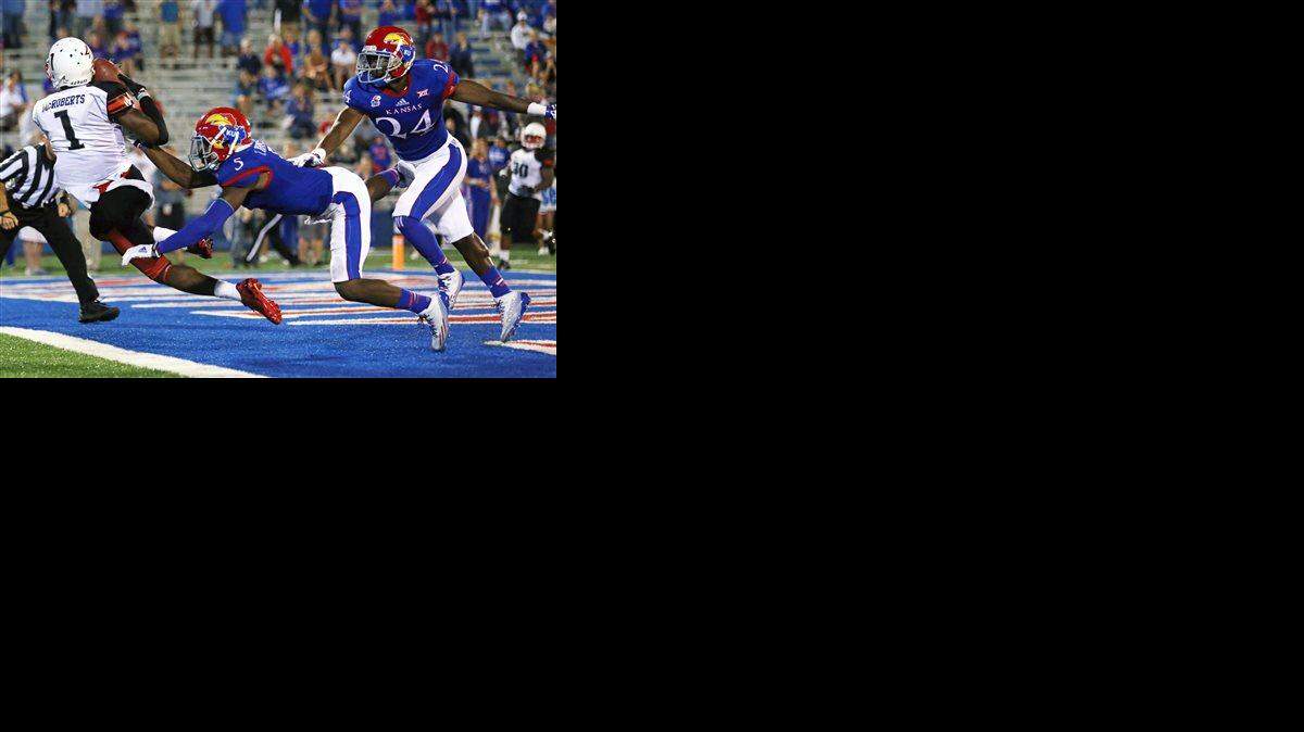 
Southeast Missouri State wide receiver Paul McRoberts (left) caught this 26-yard touchdown pass against Kansas’ Isaiah Johnson (center) and JaCorey Shepherd in the fourth quarter of Saturday’s game.
