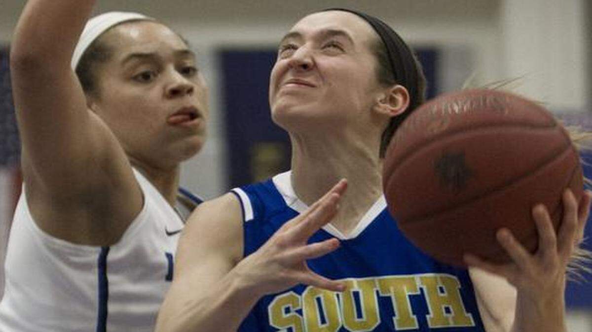 
Leavenworth’s Tyler Johnson (55) defended Olathe South’s Kylee Kopatich when the two schools played last February. The two will be teammates next season as both committed on Wednesday to play for the Kansas Jayhawks.
