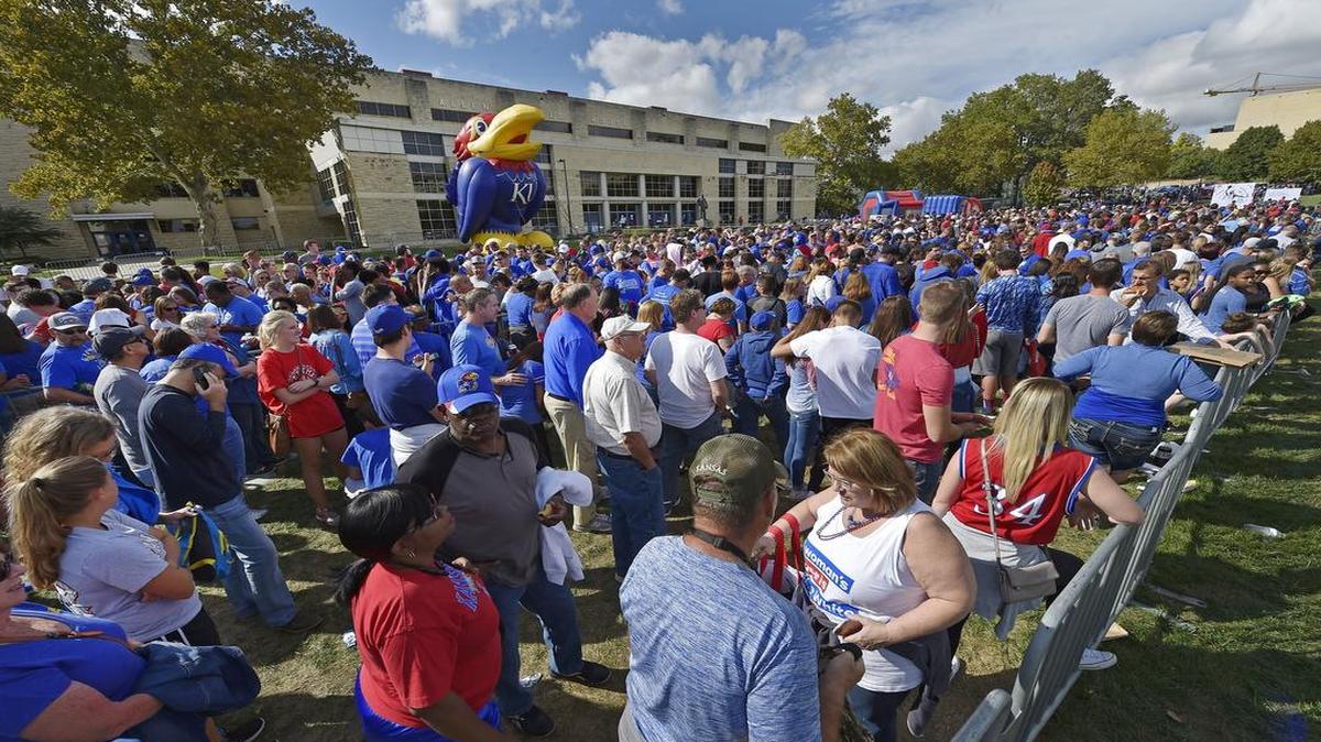 KU fans lined up early while waiting for the doors to open at Allen Fieldhouse prior to the basketball teams’ Late Night in the Phog event in October.