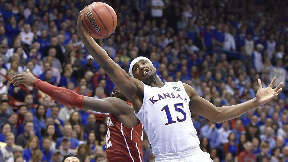 Former KU forward Carlton Bragg (15) tries to haul in a pass during the first half of a 73-63 Jayhawks victory over Oklahoma last season in Lawrence.