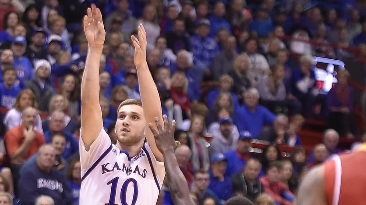KU's Svi Mykhailiuk shot over Pittsburg State’s Jabari Antwine during the first half of an exhibition game Oct. 31 at Allen Fieldhouse.