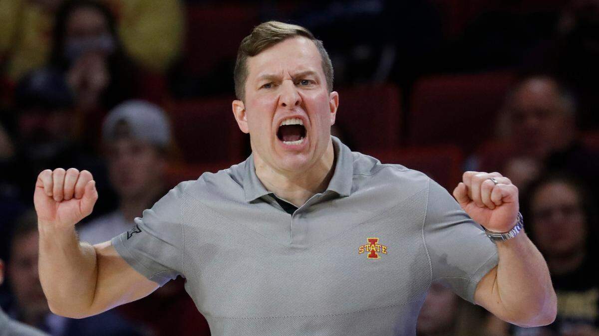 Iowa State head coach T.J. Otzelberger yells downcourt during the second half of an NCAA college basketball game against Oklahoma, Saturday, Jan. 8, 2022, in Norman, Okla. (AP Photo/Garett Fisbeck)