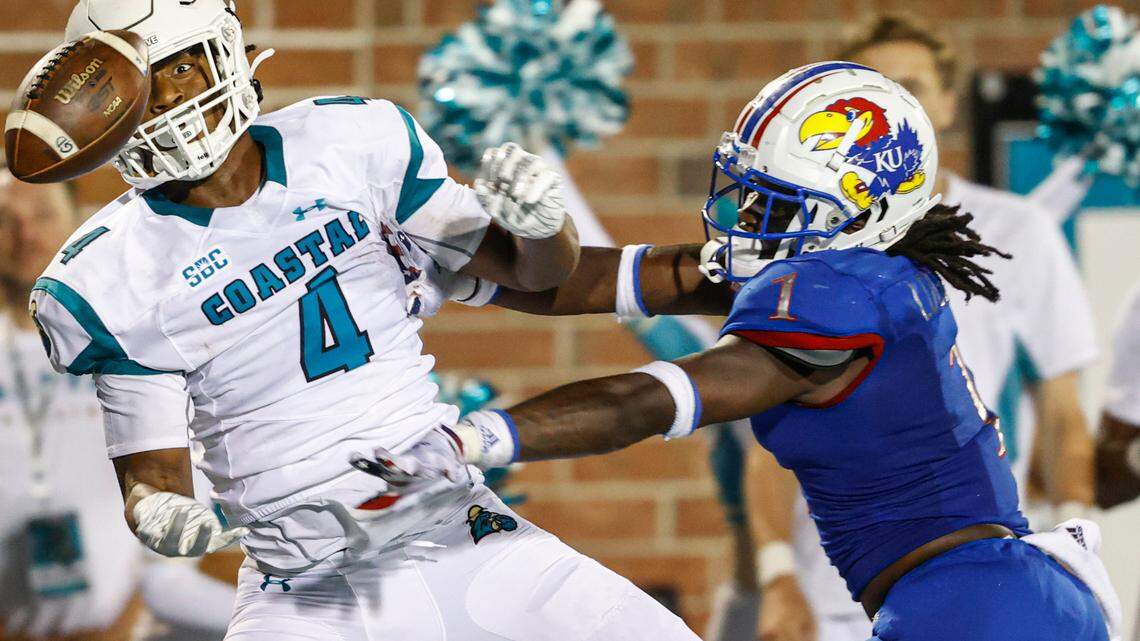 Kansas safety Kenny Logan Jr. (right) is returning for a fifth and final year of college football with the Jayhawks.