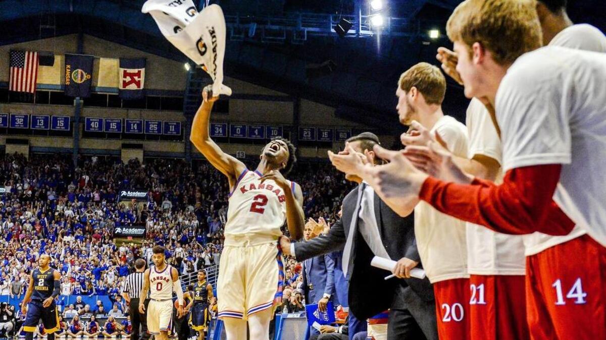 Kansas Jayhawks guard Lagerald Vick (2) started to celebrate when KU tied the game against the West Virginia Mountaineers during the second half at Allen Fieldhouse on Feb. 13, 2017. KU won in overtime, 84-80.